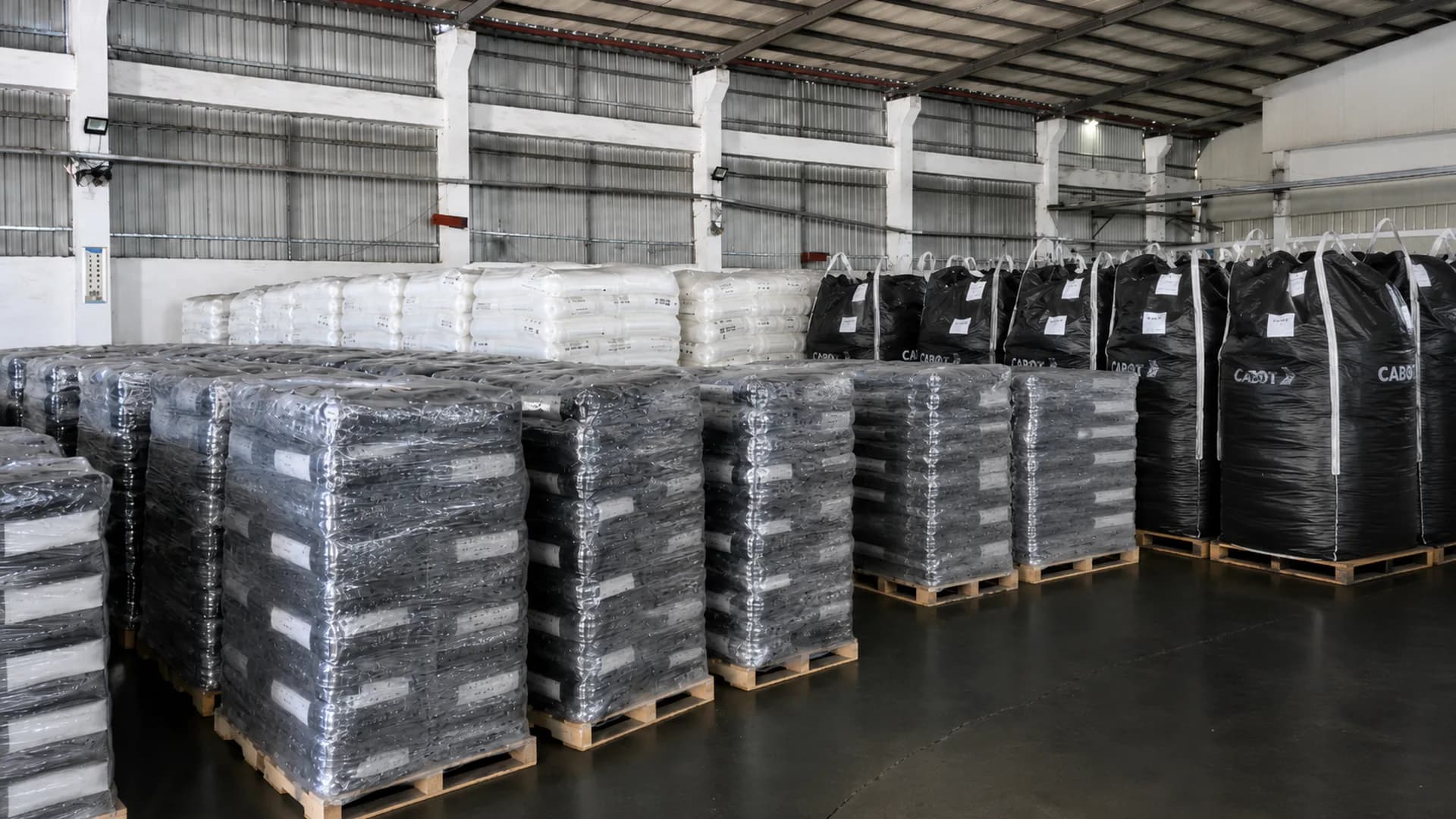 Raw material warehouse storing resin and pigment for masterbatch production