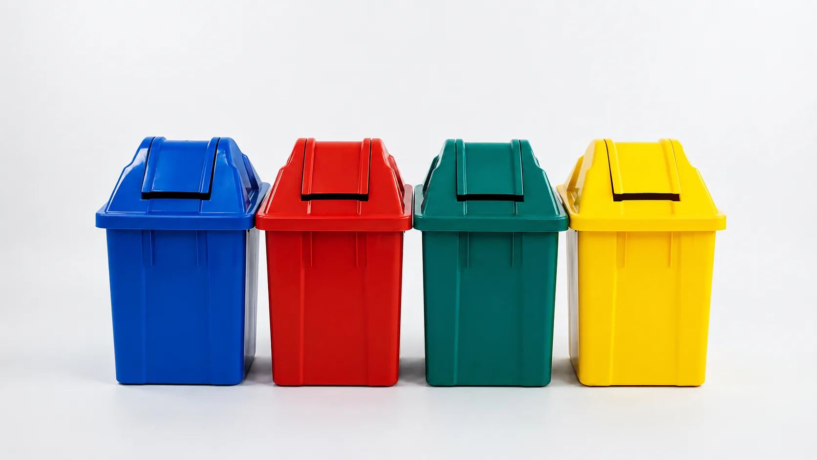Color masterbatch waste sorting bins in blue, red, green and yellow