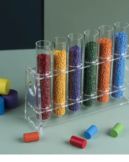 Colour masterbatch range shown in laboratory test tubes