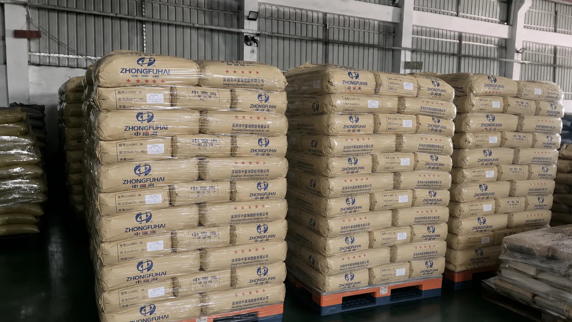Finished black masterbatch pellets packaged and palletized for export